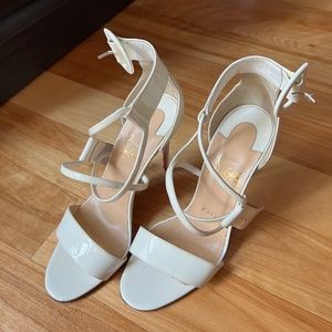 White Christian Louboutin heels
